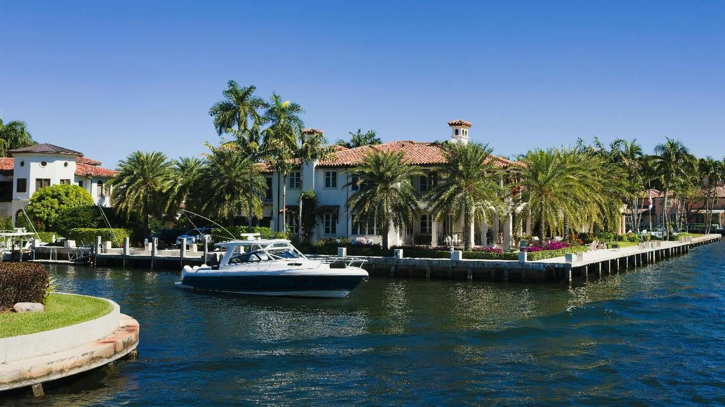 Luxurious Waterfront Homes in Tampa, Florida, with a Clear Blue Sky Above