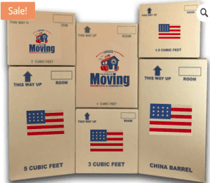 Stacked moving boxes with 'Veterans Moving' logos and American flags.